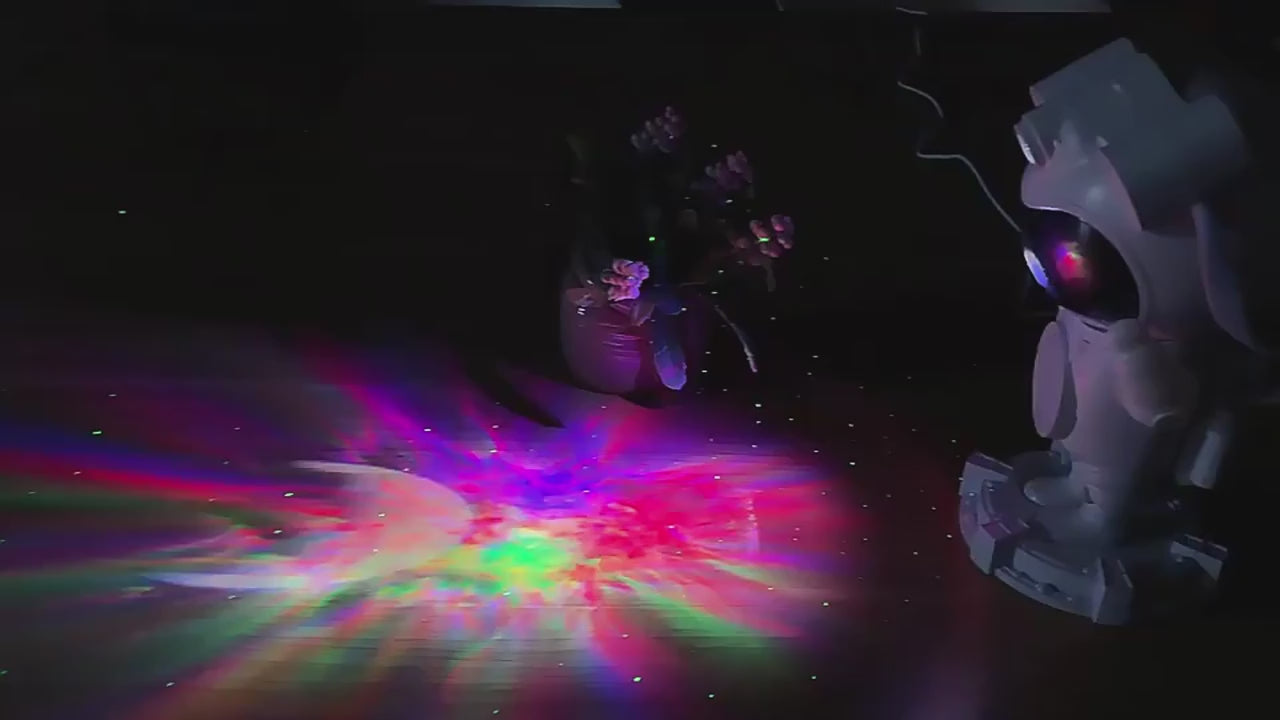 Bluetooth Quinn Astronaut Galaxy Projector with smart star light, moon projection, remote control, and timer function. Perfect for creating a cosmic ambiance in bedrooms and living spaces