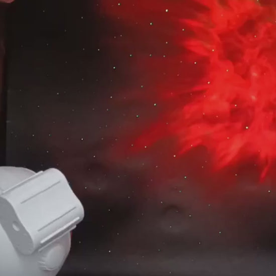 Cosmo Astronaut Galaxy Projector featuring a starry night light, smart remote control, and space-themed room decor. Ideal for bedrooms, nurseries, and relaxation spaces.